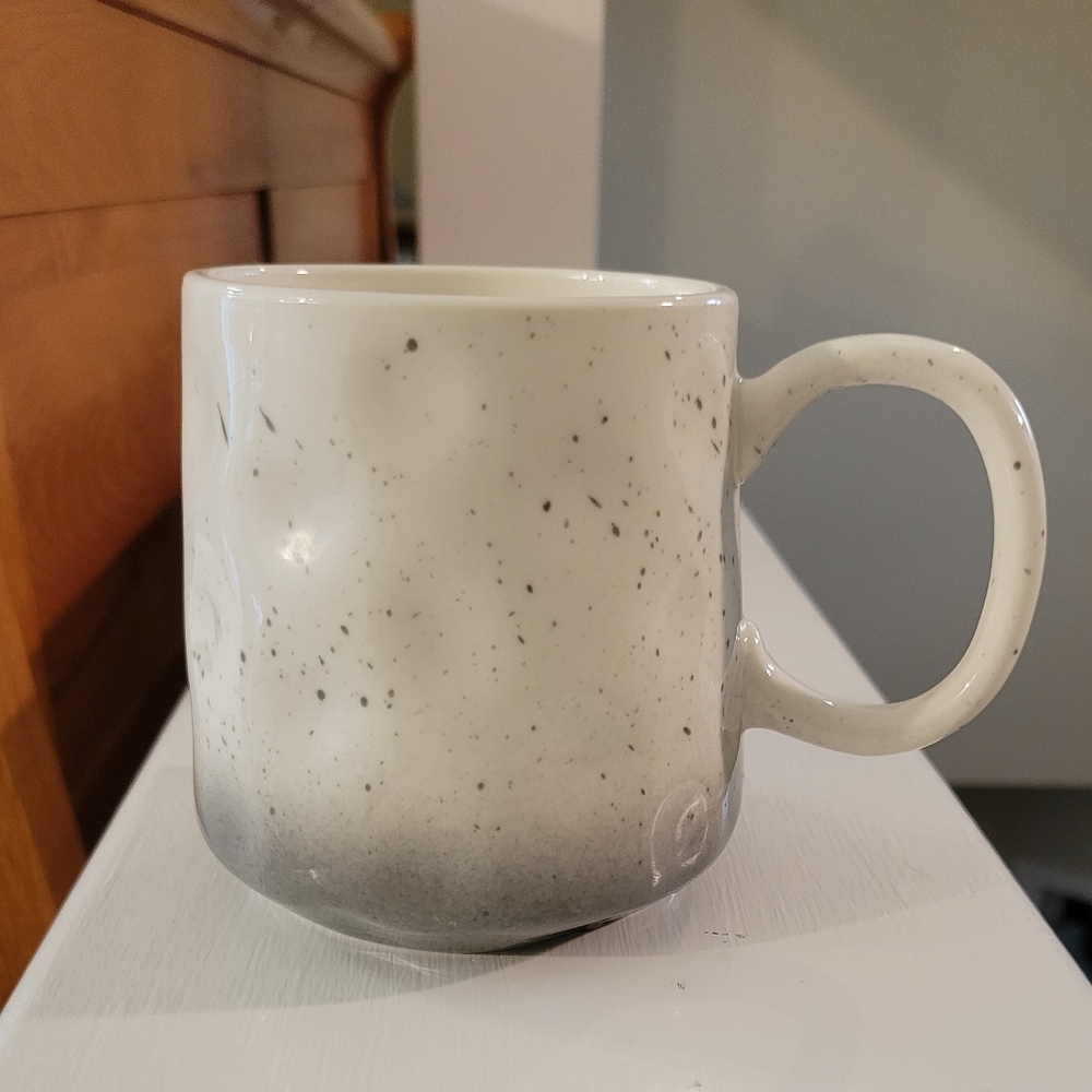Orly Maison Coffee Mug, white with Grey speckles and a Grey bottom. Like…